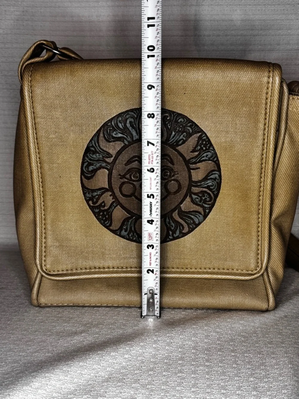 Metallic Gold Crossbody Bag with Sun Medallion